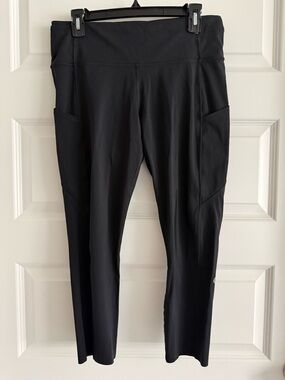 Lululemon High-Waist Black leggings with raw edge hem. Size 12